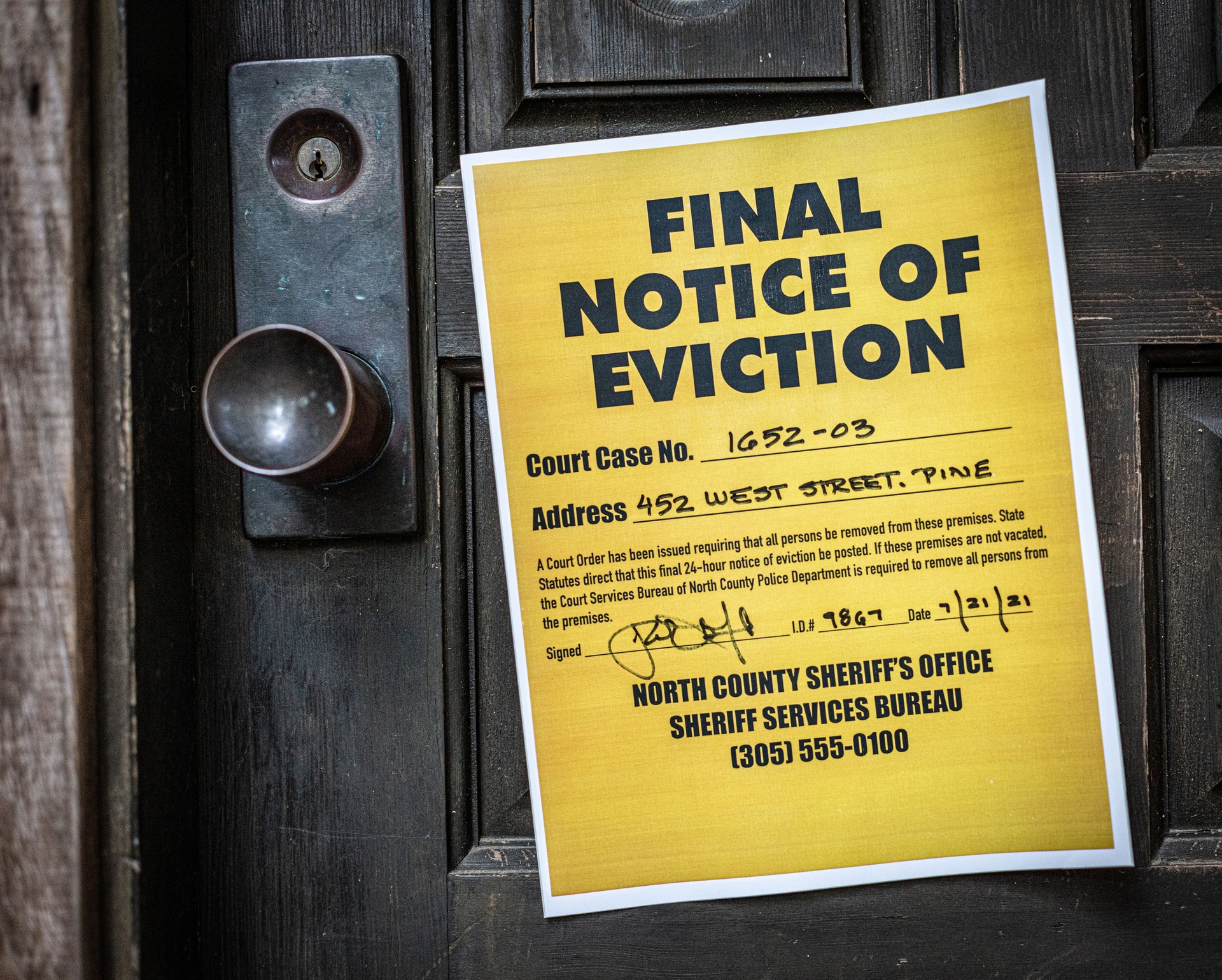 Eviction notice on door of house
